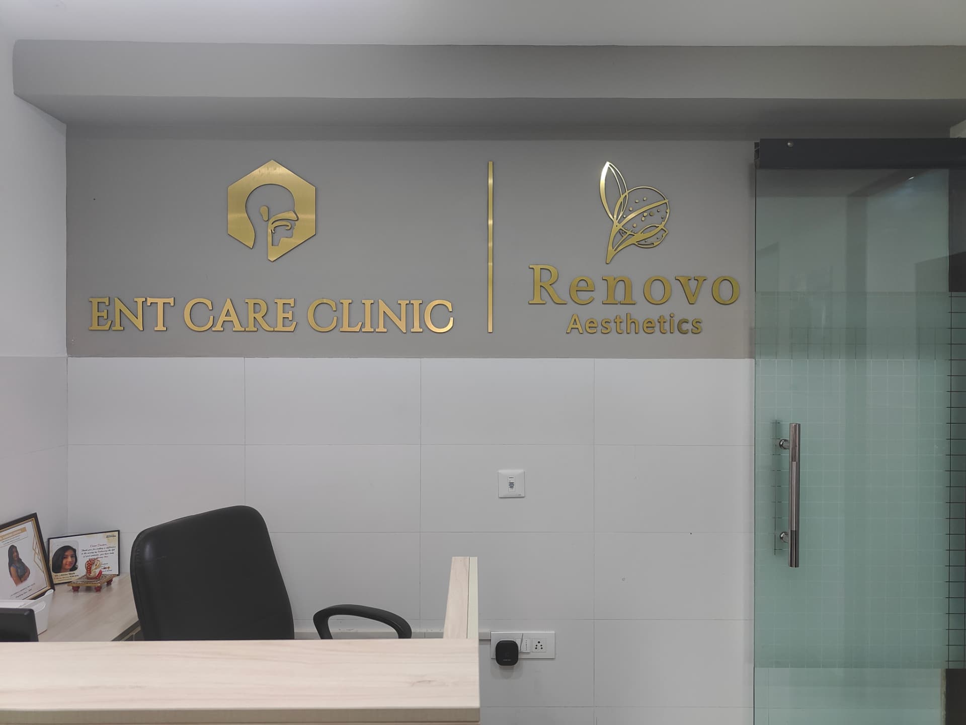ENT Care Clinic reception desk and branding